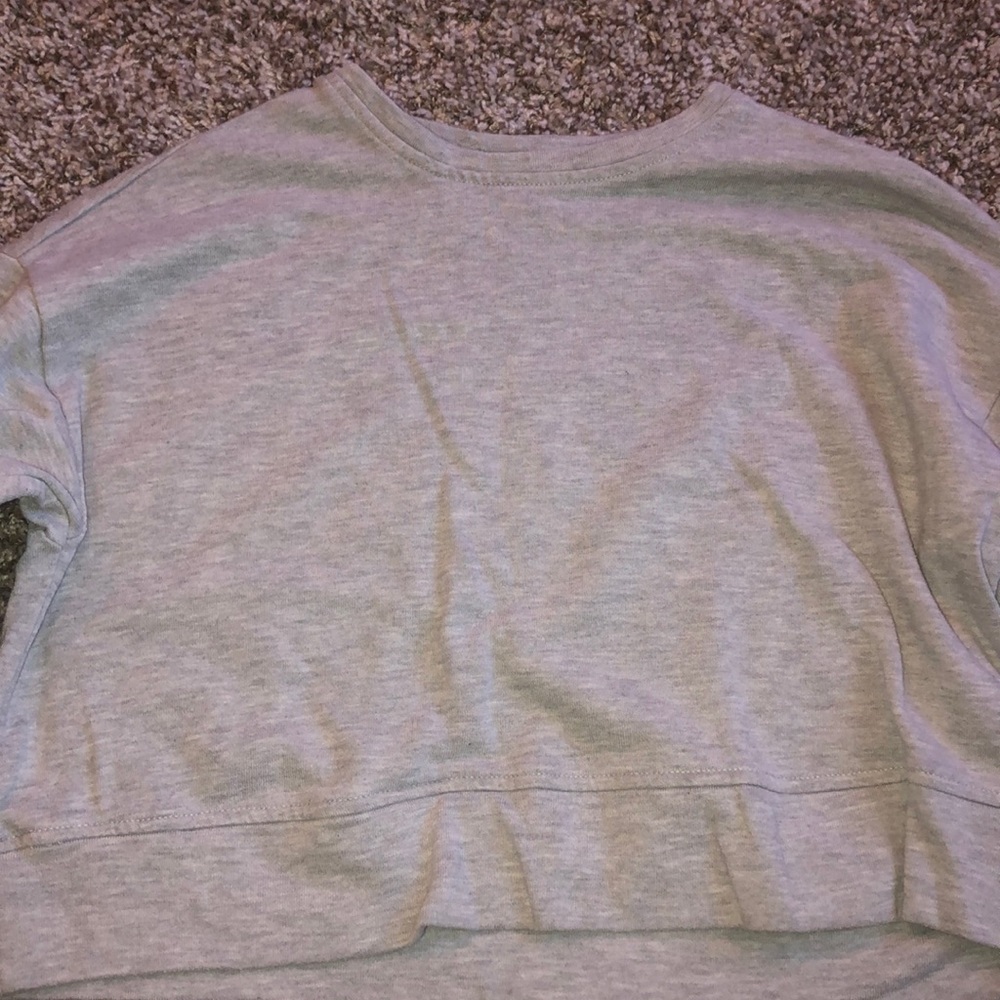 long sleeved grey shirt